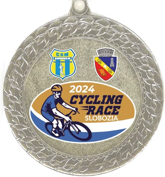 Medalia argintie a concursului „2024 Cycling Race Slobozia”, cu sigla CSM Unirea și stema municipiului.